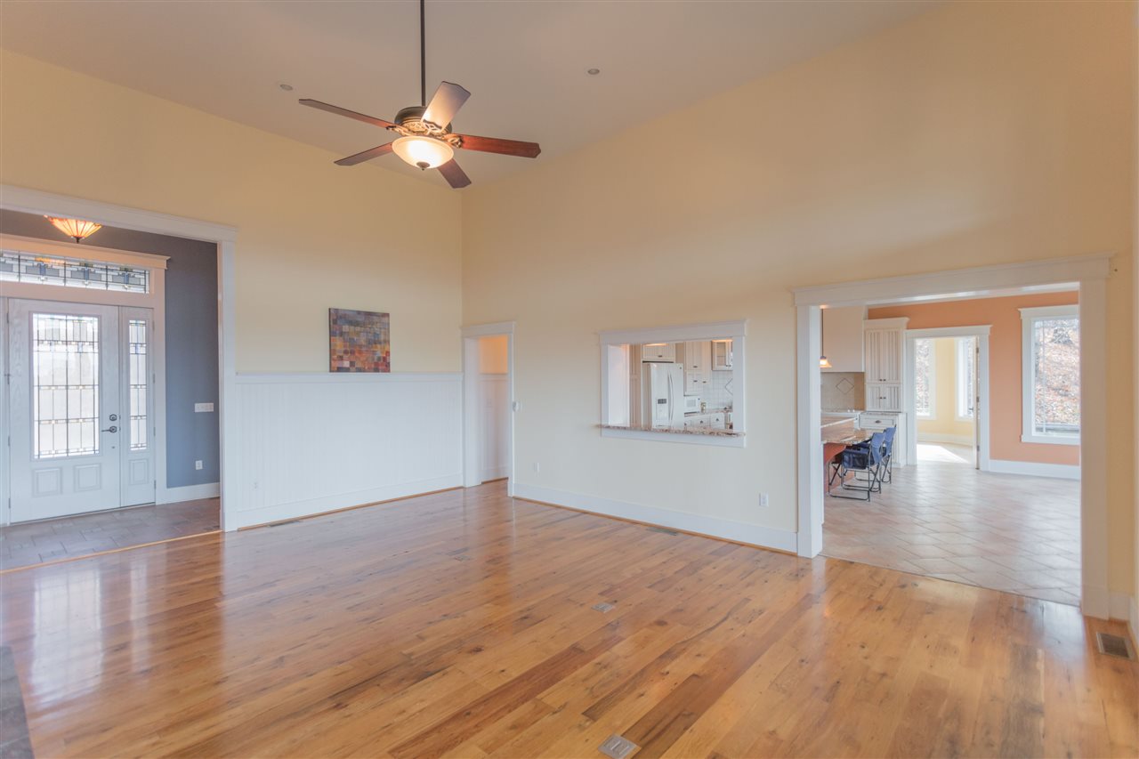 110 East Ridge Drive Lexington, VA 24450 - Photo 39 of 50 a view of an empty room with wooden floor and a window