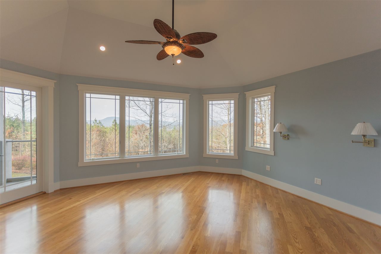 110 East Ridge Drive Lexington, VA 24450 - Photo 41 of 50 a view of an empty room with wooden floor and a window