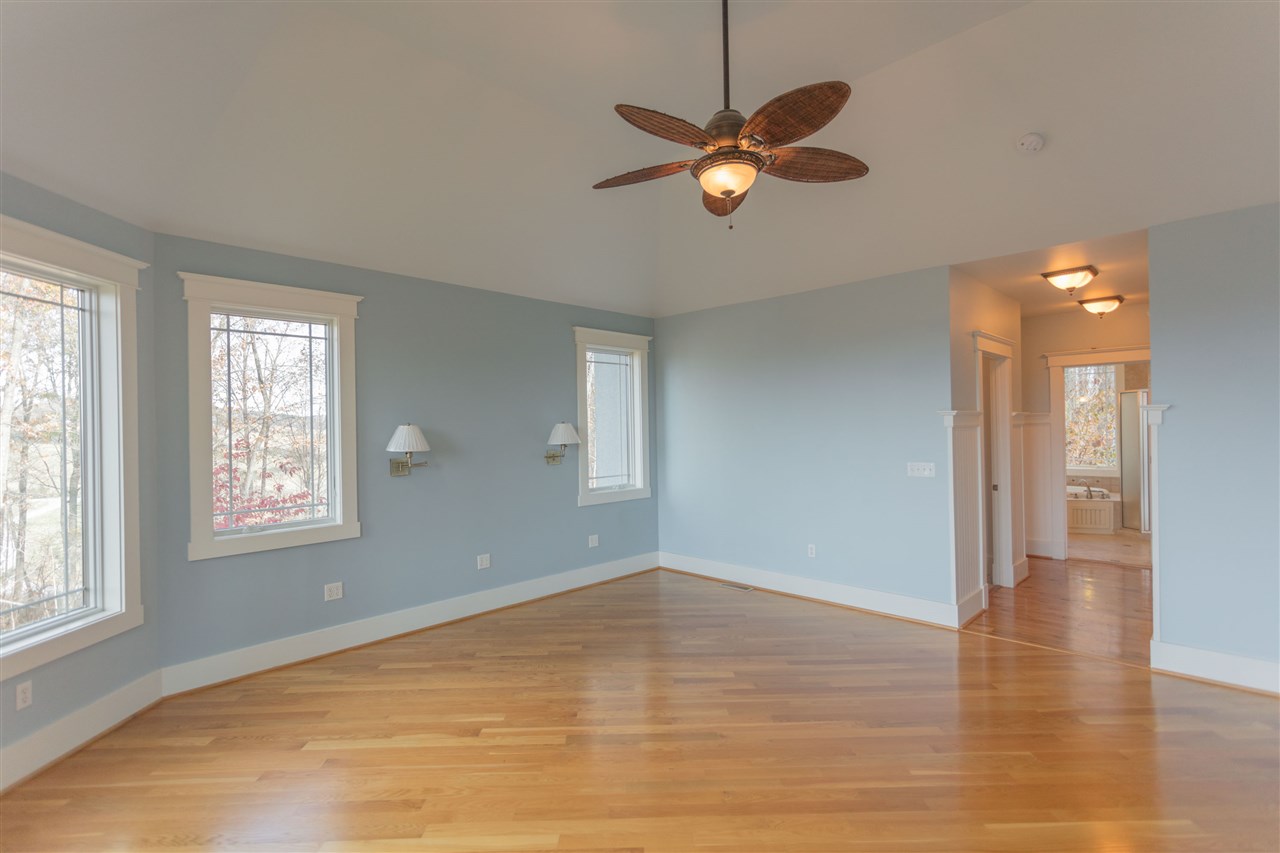 110 East Ridge Drive Lexington, VA 24450 - Photo 44 of 50 an empty room with wooden floor and windows