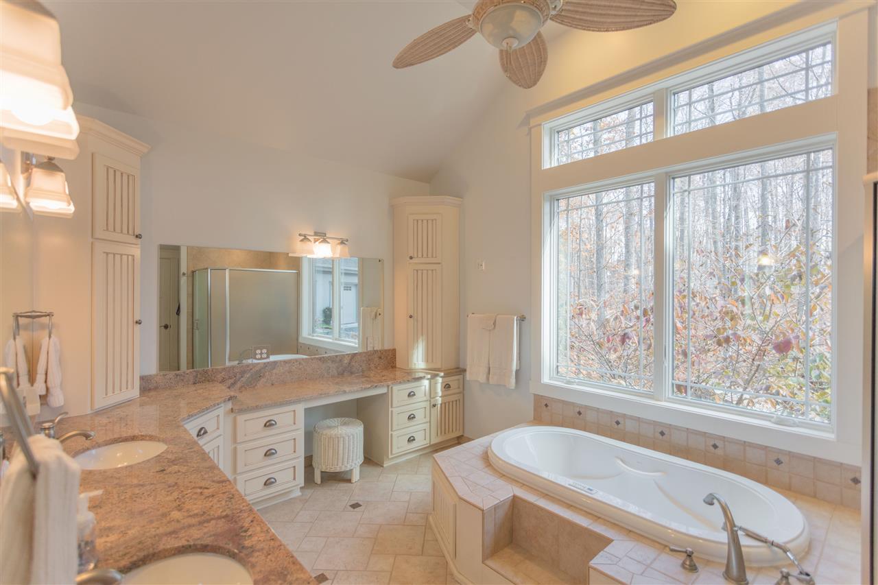 110 East Ridge Drive Lexington, VA 24450 - Photo 49 of 50 a spacious bathroom with a tub sink and mirror