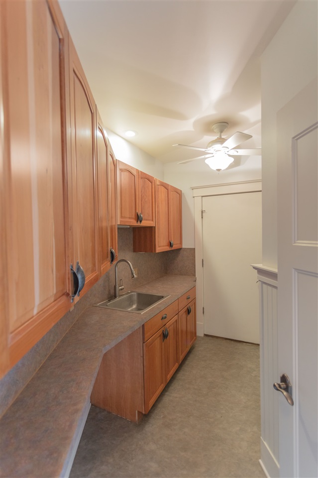 110 East Ridge Drive Lexington, VA 24450 - Photo 6 of 50 a view of a kitchen with cabinets and wooden floor