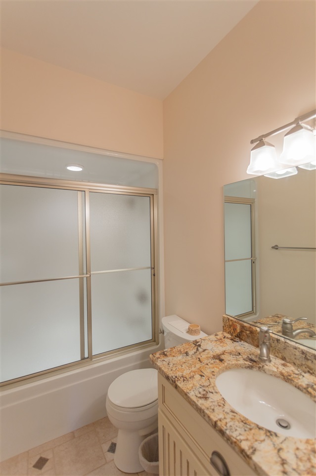 110 East Ridge Drive Lexington, VA 24450 - Photo 9 of 50 a bathroom with a granite countertop sink toilet and shower