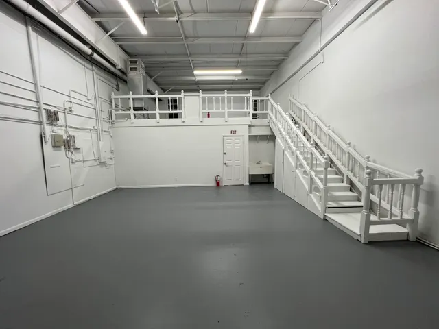 a view of a garage with furniture