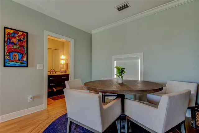 a view of a roof deck with furniture