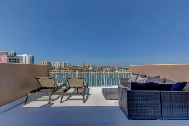 an aerial view of a house with outdoor space