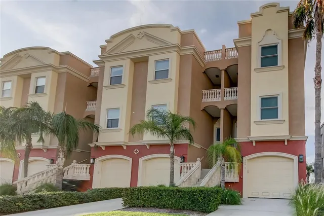 a kitchen with a sink stainless steel appliances and cabinets