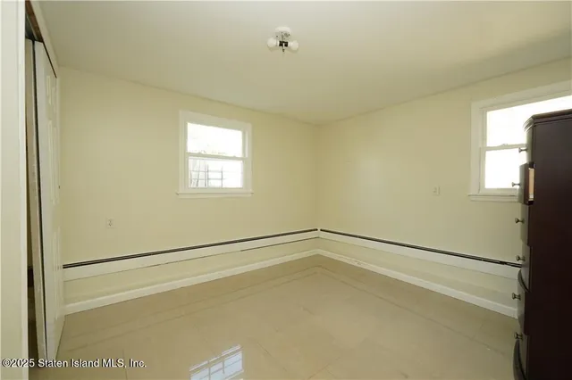 a view of a kitchen with electric appliances