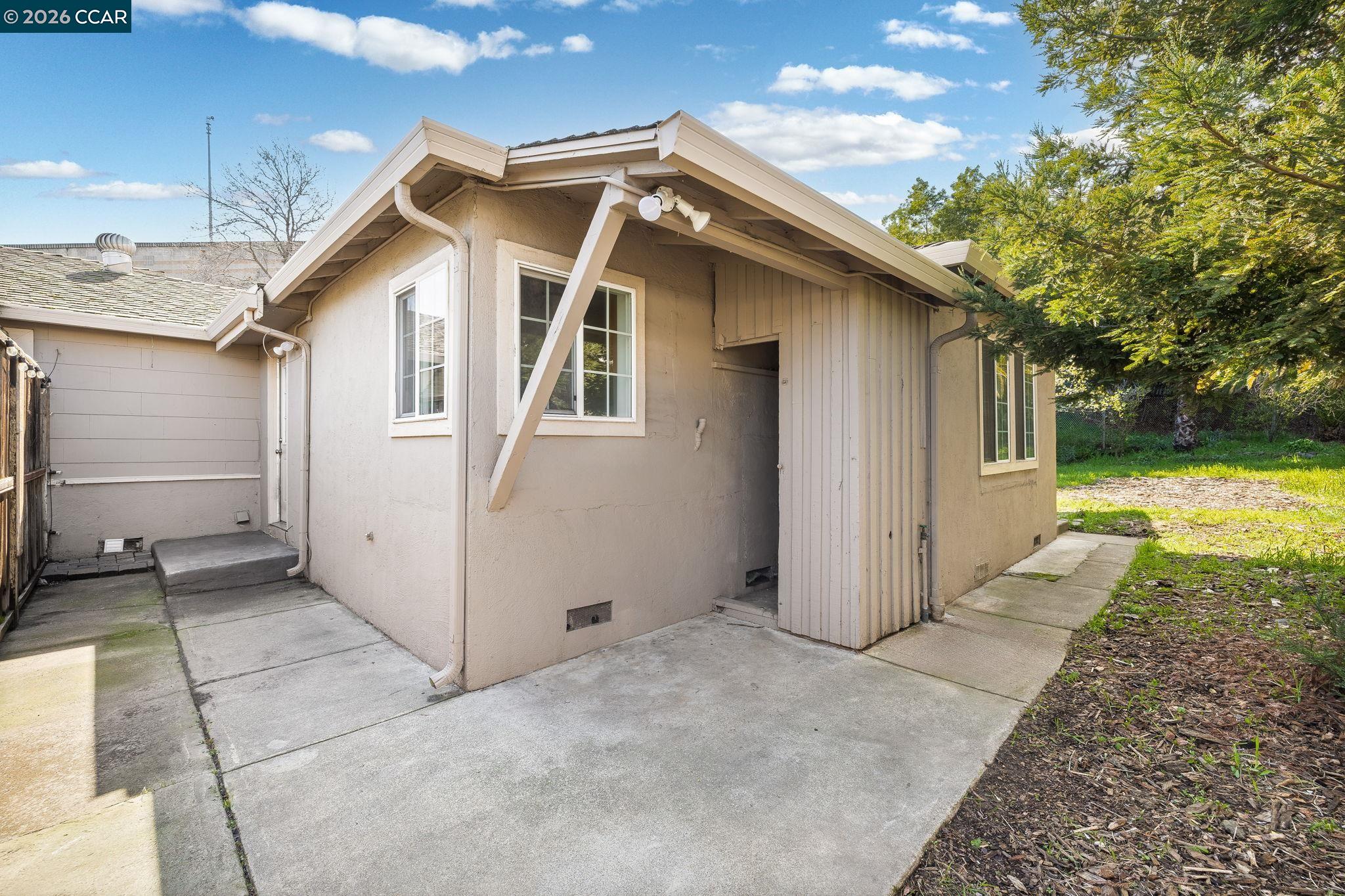 4820 Blum Road Martinez, CA 94553 - Photo 18 of 46 a view of a house with a backyard
