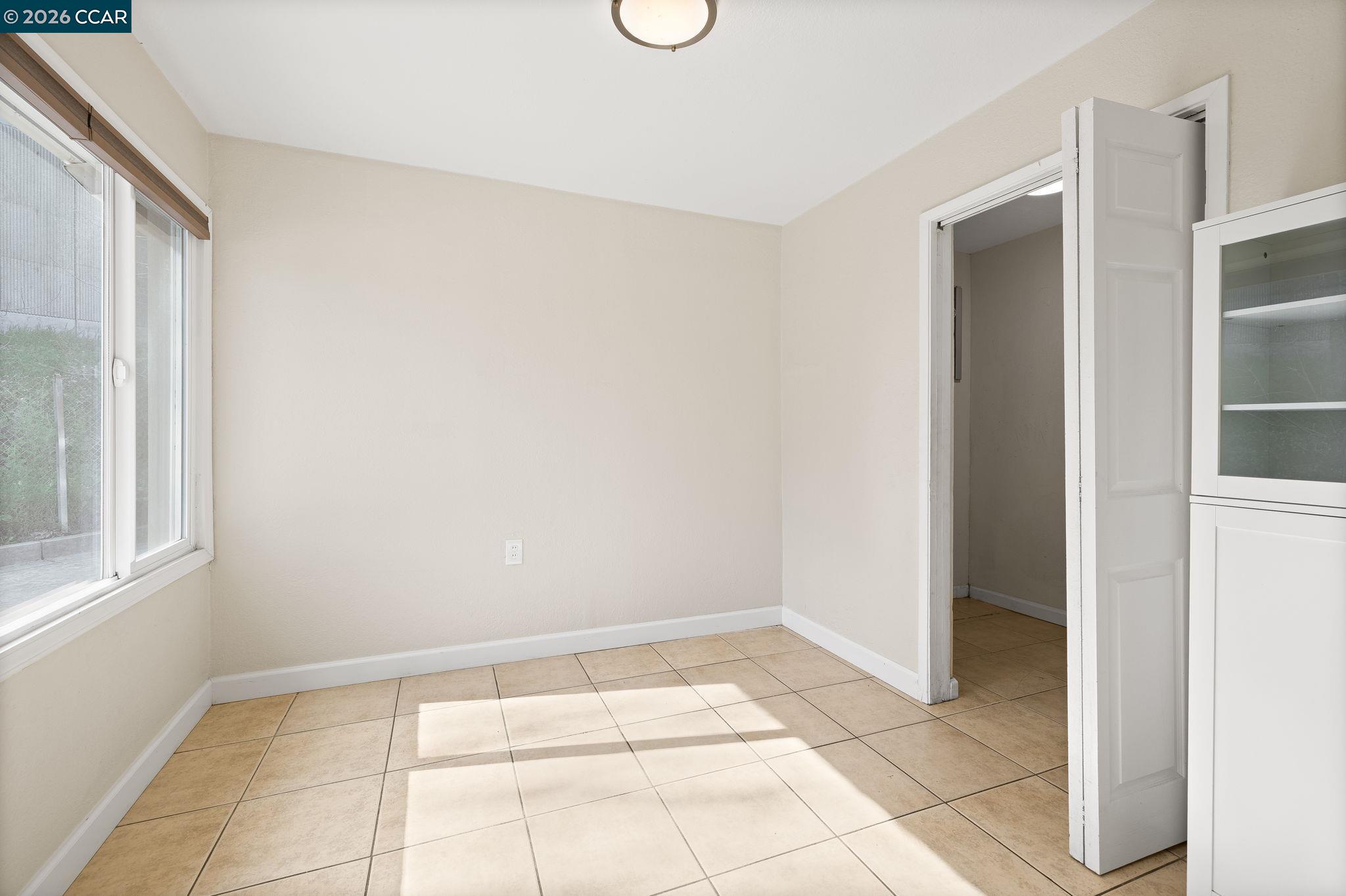4820 Blum Road Martinez, CA 94553 - Photo 22 of 46 a view of an empty room with windows and entryway