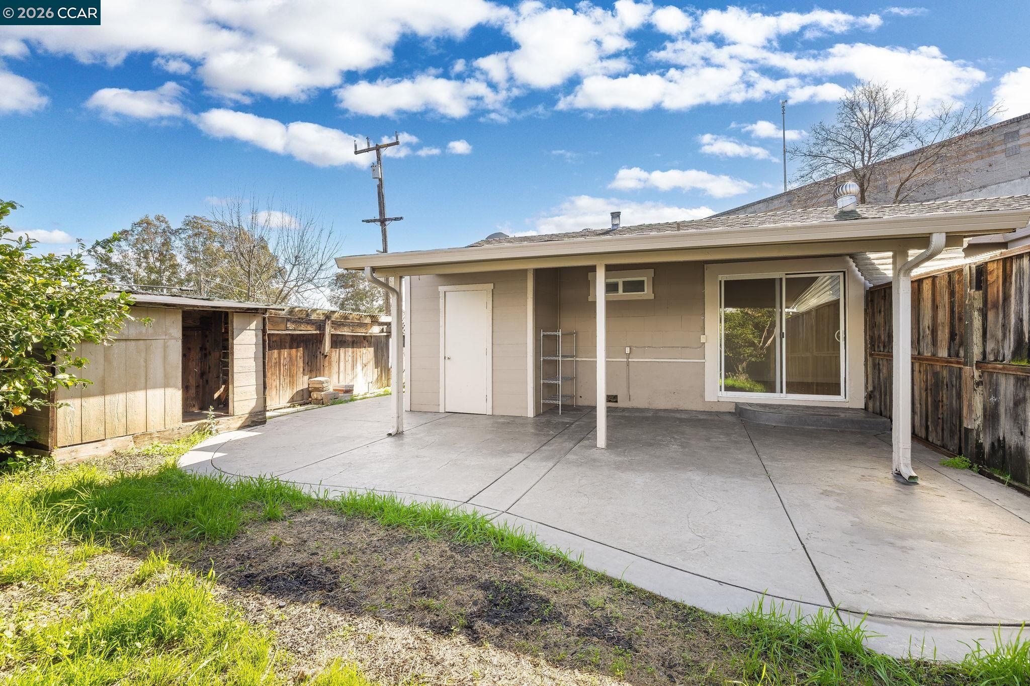 4820 Blum Road Martinez, CA 94553 - Photo 25 of 46 a view of a house with a patio and a yard