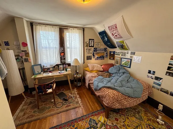 a room with toys and dresser