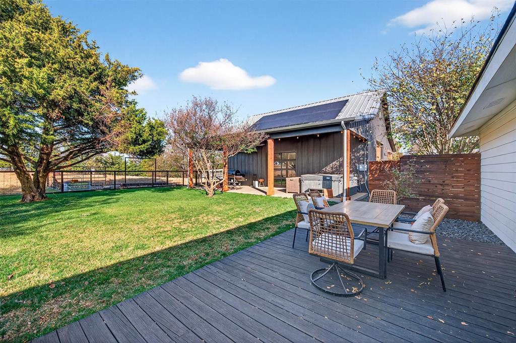 5816 Luella Road Sherman, TX 75090 - Photo 23 of 36 a view of a house with backyard porch and sitting area