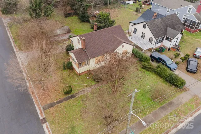 an aerial view of residential house with outdoor space