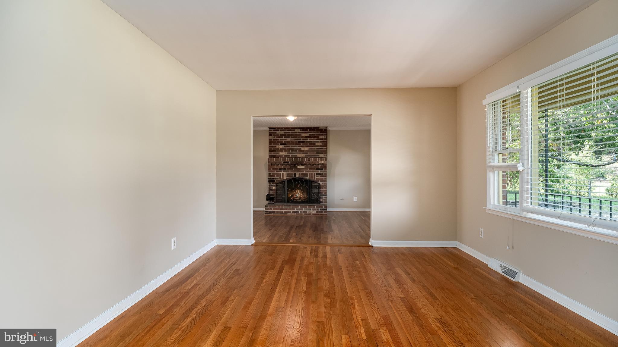 348 Chapel Green Road Fredericksburg, VA 22405 - Photo 6 of 27 LIVING ROOM LOOKING INTO FAMILY ROOM