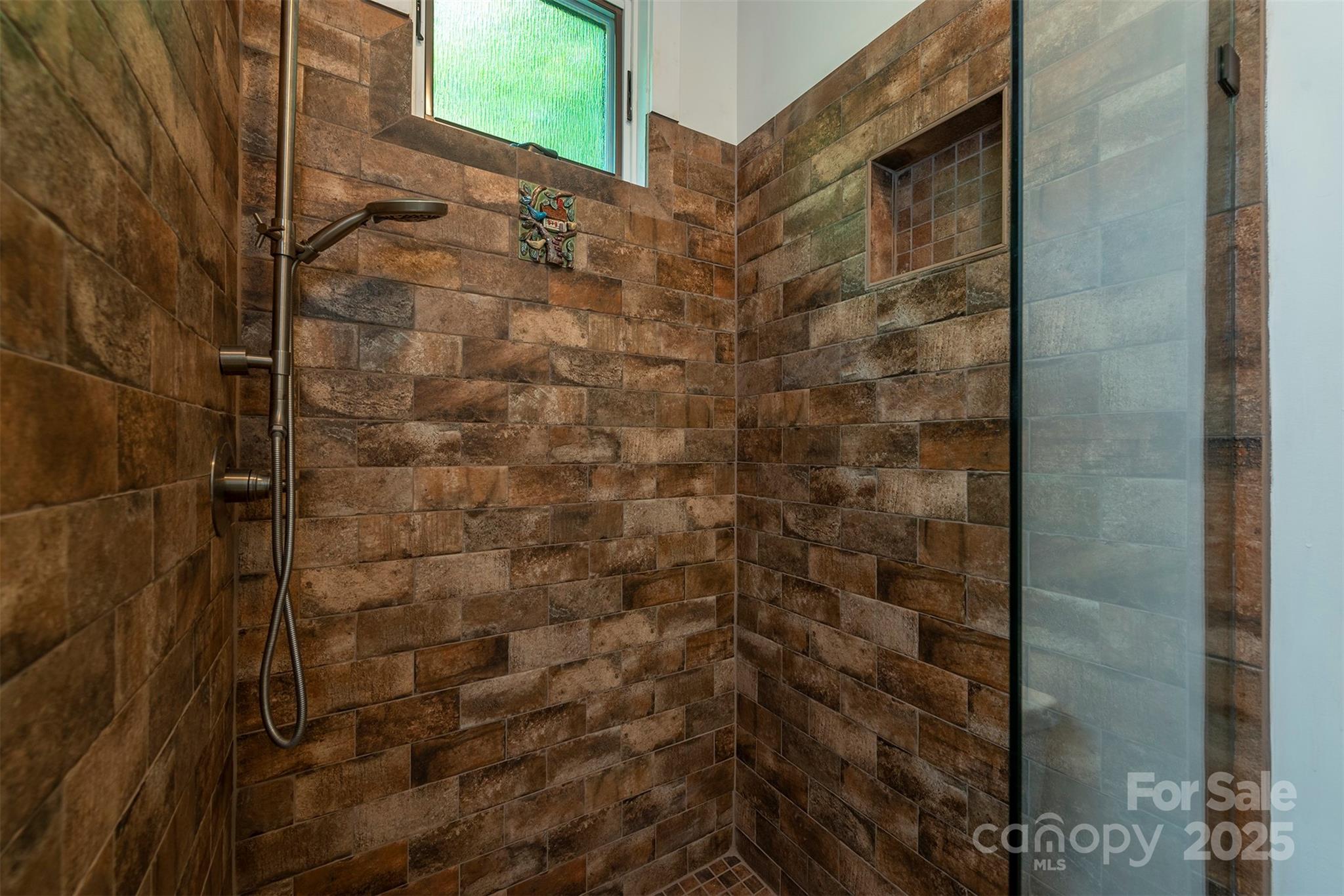 401 Winterle Road Black Mountain, NC 28711 - Photo 16 of 44 a bathroom with a shower