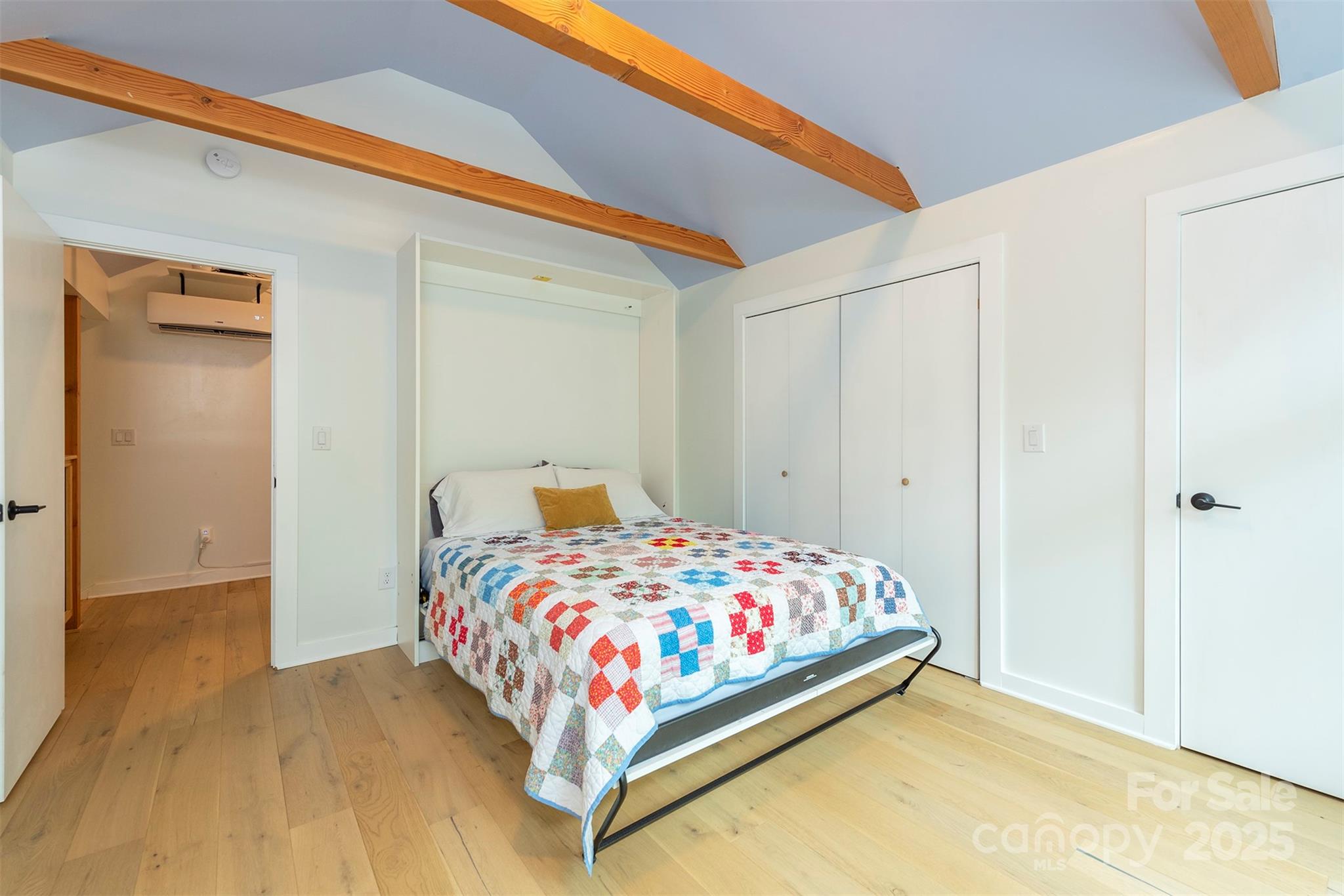 401 Winterle Road Black Mountain, NC 28711 - Photo 21 of 44 a bedroom with a bed and a closet