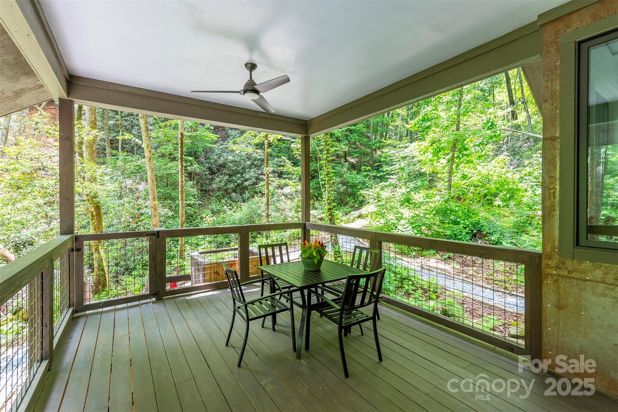 401 Winterle Road Black Mountain, NC 28711 - Photo 33 of 44 a view of a dining room with furniture window and wooden floor