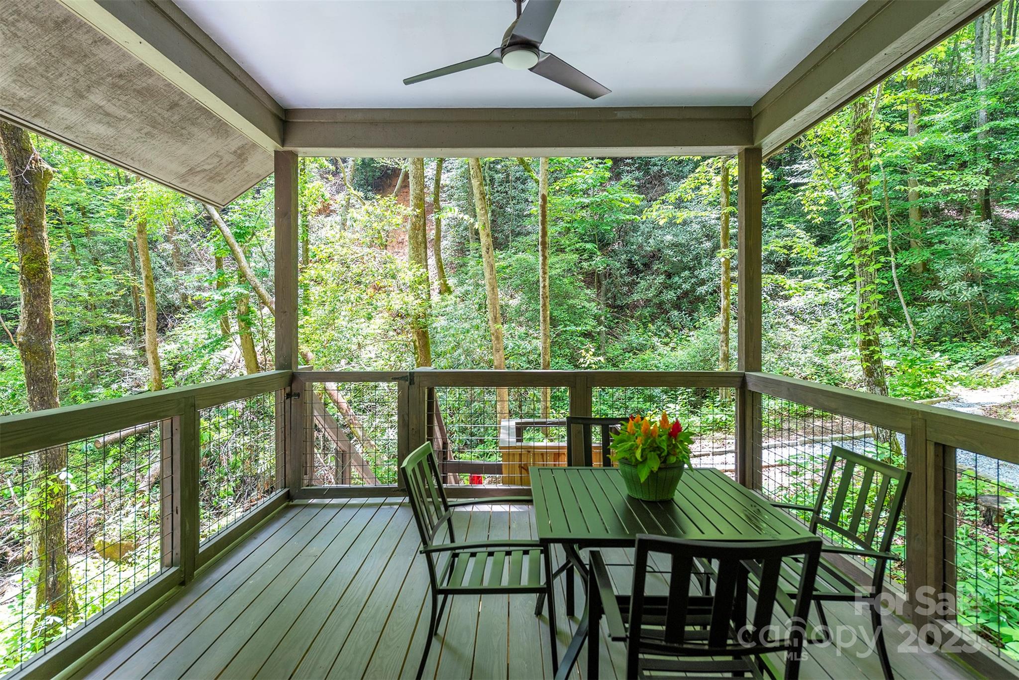 401 Winterle Road Black Mountain, NC 28711 - Photo 34 of 44 a view of a balcony with furniture and wooden floor