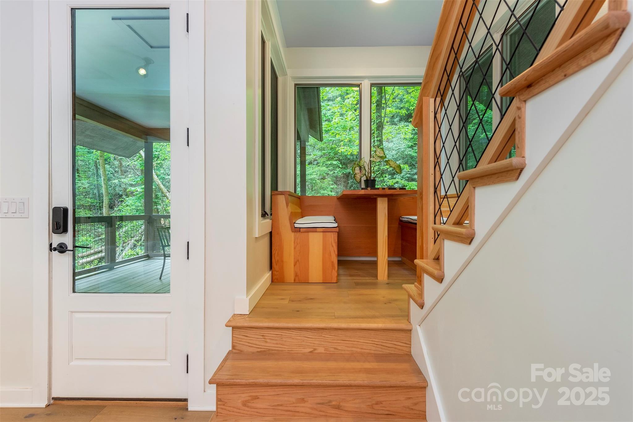 401 Winterle Road Black Mountain, NC 28711 - Photo 6 of 44 a view of entryway and hall with wooden floor