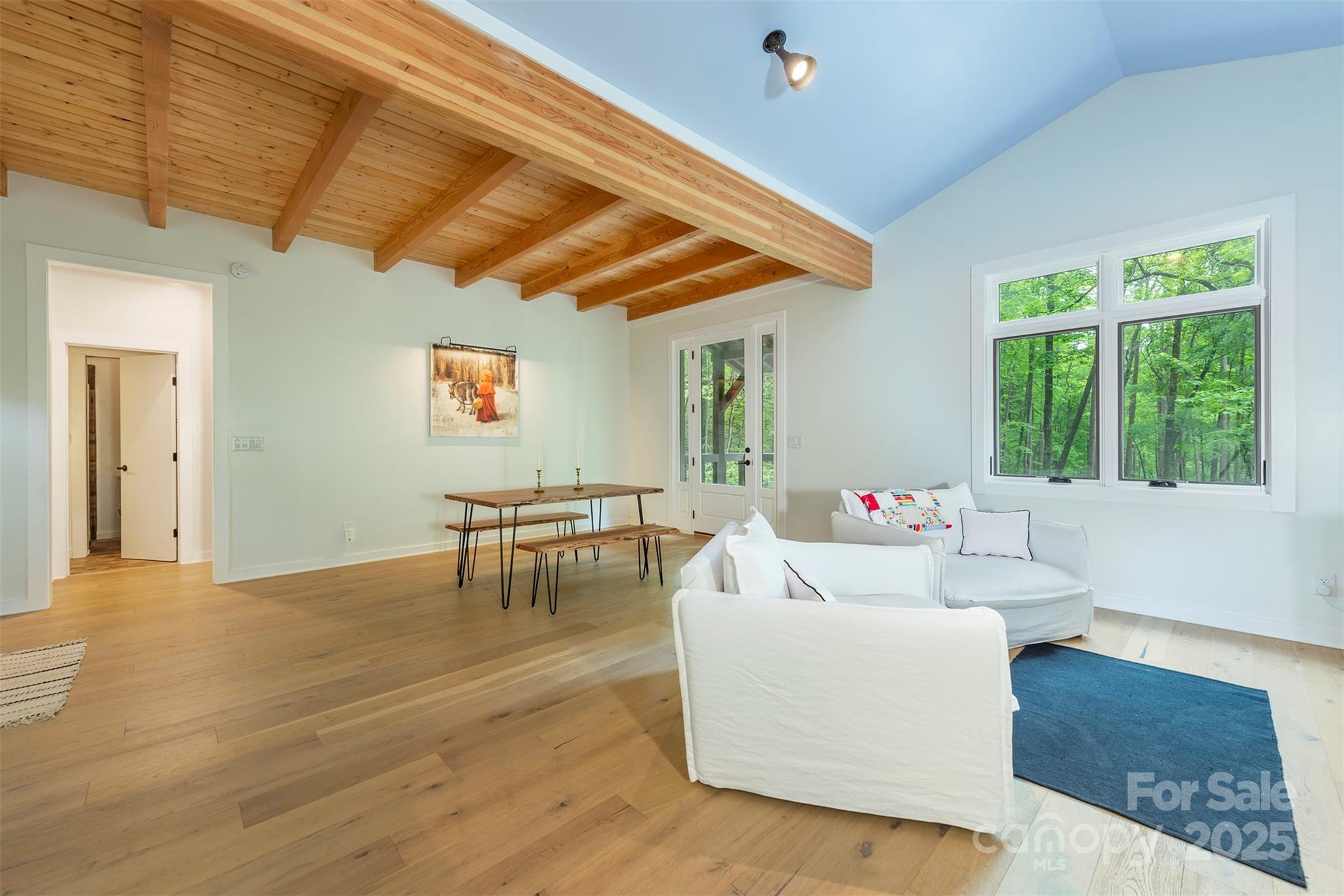 401 Winterle Road Black Mountain, NC 28711 - Photo 7 of 44 a living room with furniture and a table