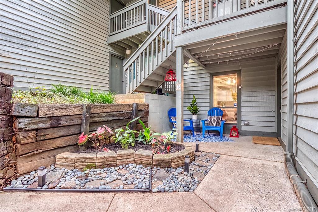 4948 Sardis Road, Unit B Charlotte, NC 28270 - Photo 2 of 30 front view of a house with a patio