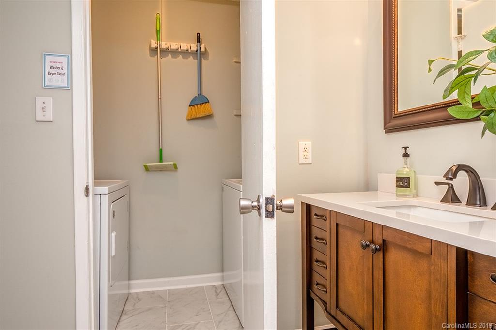 4948 Sardis Road, Unit B Charlotte, NC 28270 - Photo 20 of 30 a bathroom with a sink and mirror
