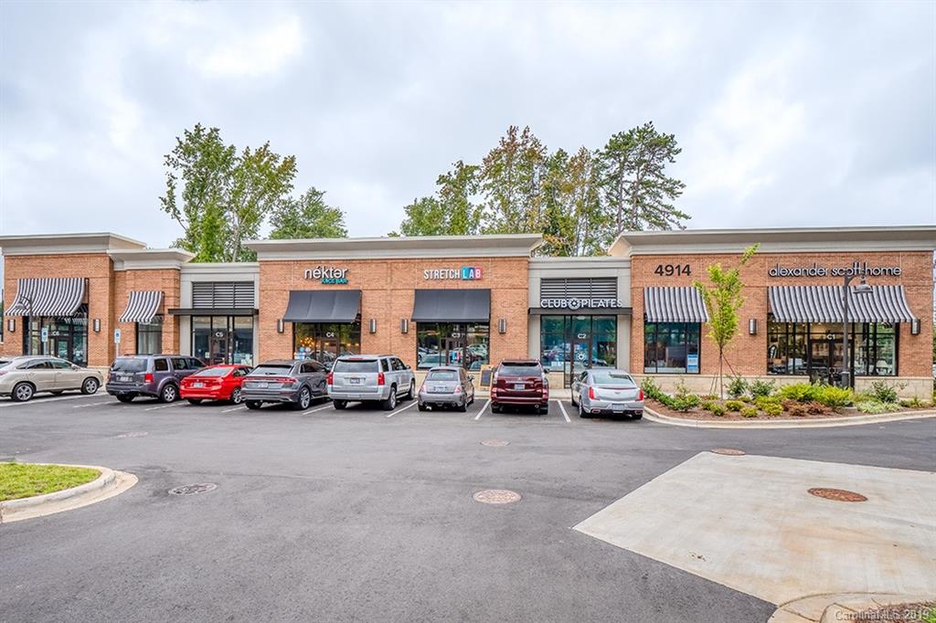 4948 Sardis Road, Unit B Charlotte, NC 28270 - Photo 30 of 30 a view of building with cars parked in front of it