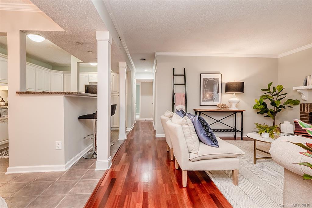 4948 Sardis Road, Unit B Charlotte, NC 28270 - Photo 6 of 30 a living room with furniture and a wooden floor