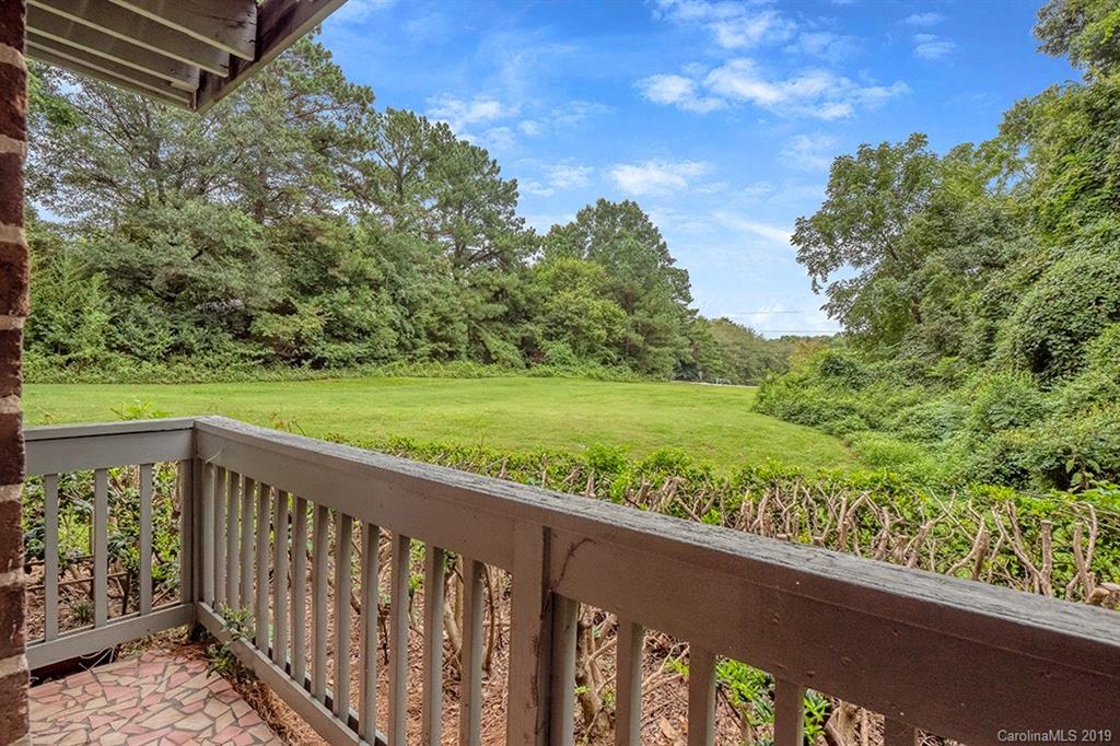 4948 Sardis Road, Unit B Charlotte, NC 28270 - Photo 10 of 30 a view of a wooden fence and floor