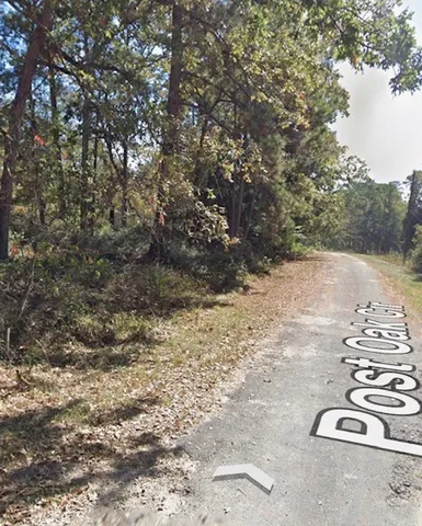 a view of outdoor space and a yard