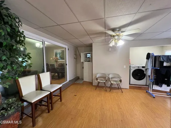 a room with gym equipment and a mirror