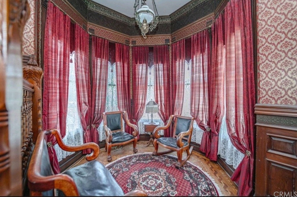 3121 Mulberry Street Riverside, CA 92501 - Photo 28 of 67 a living room with furniture and a chandelier