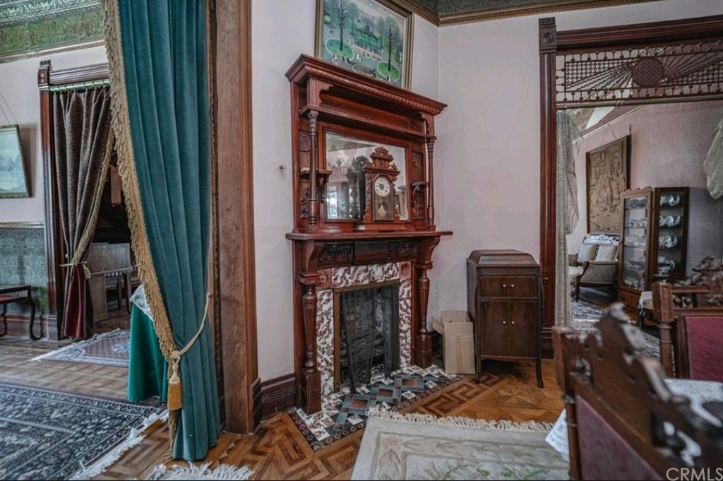 3121 Mulberry Street Riverside, CA 92501 - Photo 54 of 67 a living room with fireplace furniture and a rug