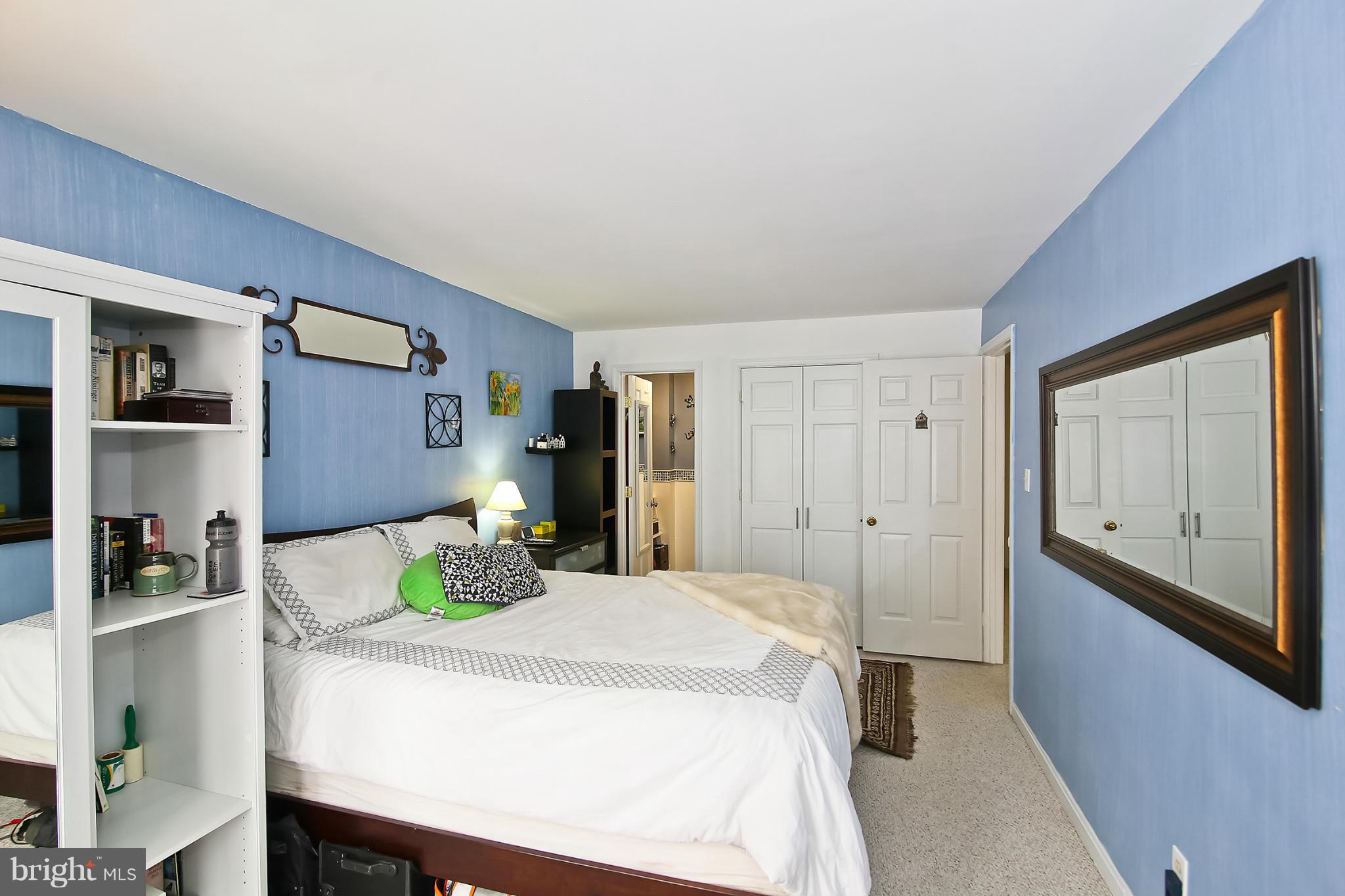 2103 North Rolfe Street, Unit A Arlington, VA 22209 - Photo 2 of 28 a kitchen with a table and chairs