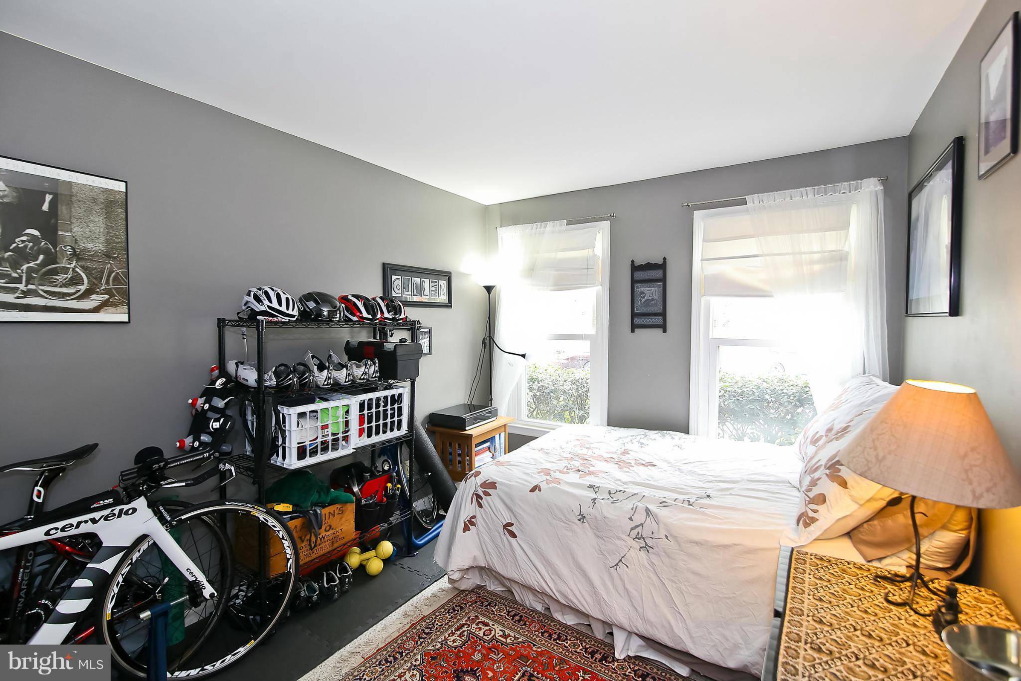 2103 North Rolfe Street, Unit A Arlington, VA 22209 - Photo 15 of 28 a bedroom with bed and a window