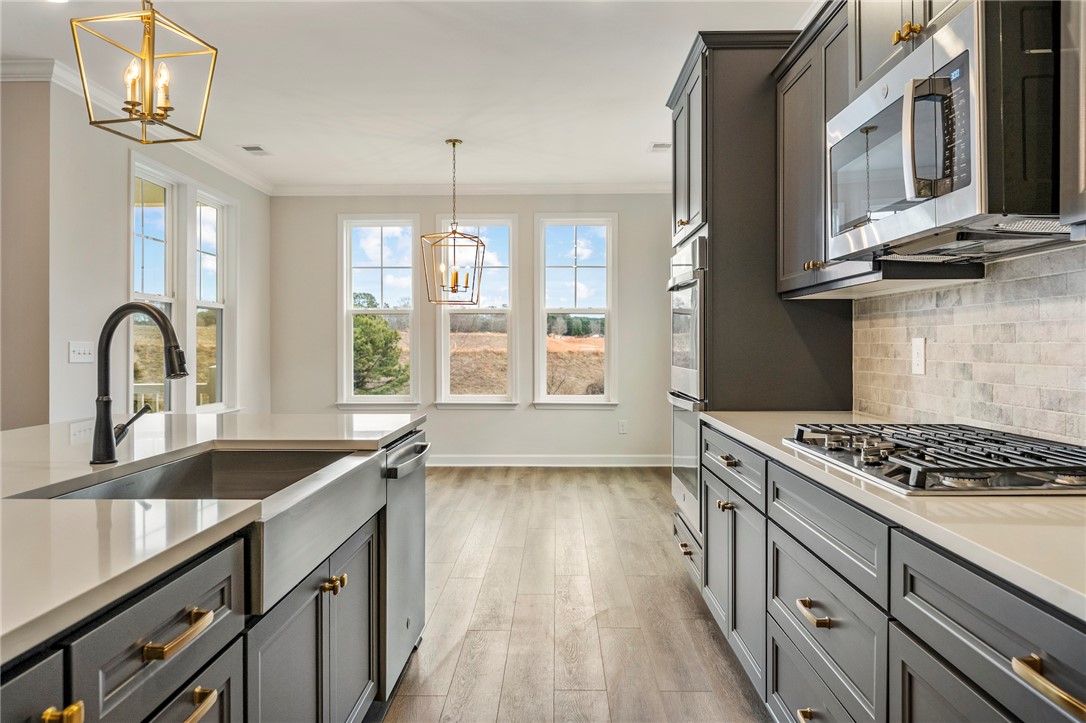3140 Midway Road Anderson, SC 29621 - Photo 13 of 39 Bright and airy kitchen features modern appliances, spacious countertops, and ample natural light.