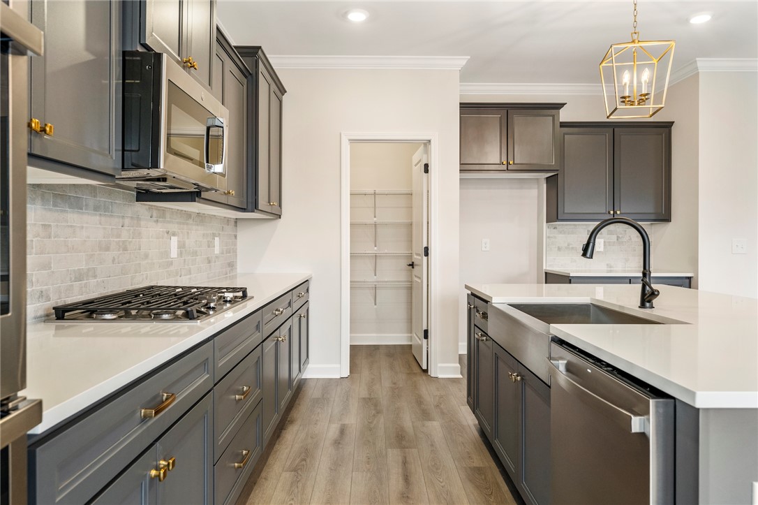3140 Midway Road Anderson, SC 29621 - Photo 14 of 39 This sleek kitchen features modern amenities and a functional layout, perfect for daily living and entertaining.