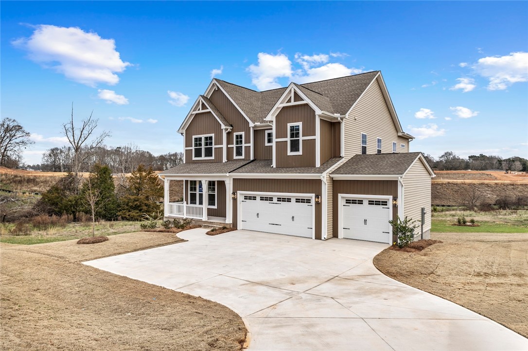 3140 Midway Road Anderson, SC 29621 - Photo 2 of 39 This newly constructed home features a welcoming facade and ample parking, ideal for modern living.