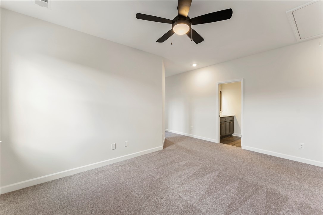 3140 Midway Road Anderson, SC 29621 - Photo 25 of 39 This spacious bedroom offers ample room and comfortable carpeting.