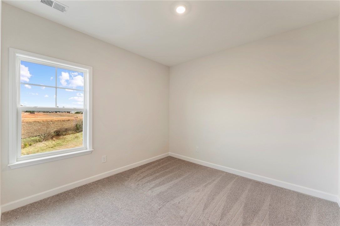 3140 Midway Road Anderson, SC 29621 - Photo 26 of 39 This airy room offers a bright, versatile space with ample natural light.