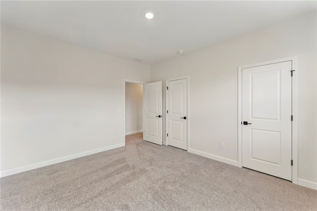 3140 Midway Road Anderson, SC 29621 - Photo 31 of 39 This spacious bedroom offers a neutral canvas ready for personalization and comfortable living.