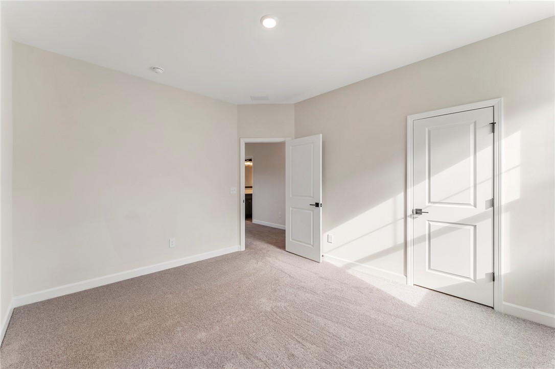3140 Midway Road Anderson, SC 29621 - Photo 34 of 39 This inviting bedroom offers soft carpeting and bright recessed lighting.