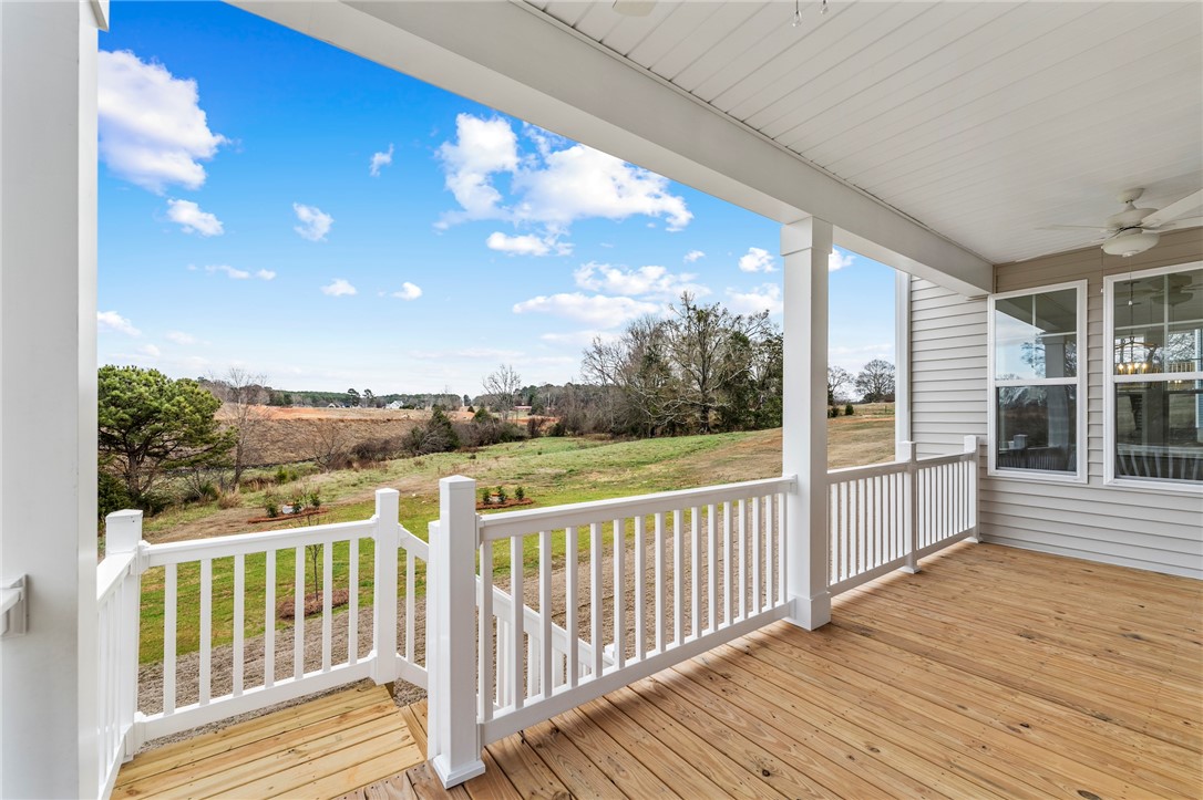 3140 Midway Road Anderson, SC 29621 - Photo 36 of 39 This inviting porch offers tranquil views of the surrounding natural landscape, perfect for relaxation.