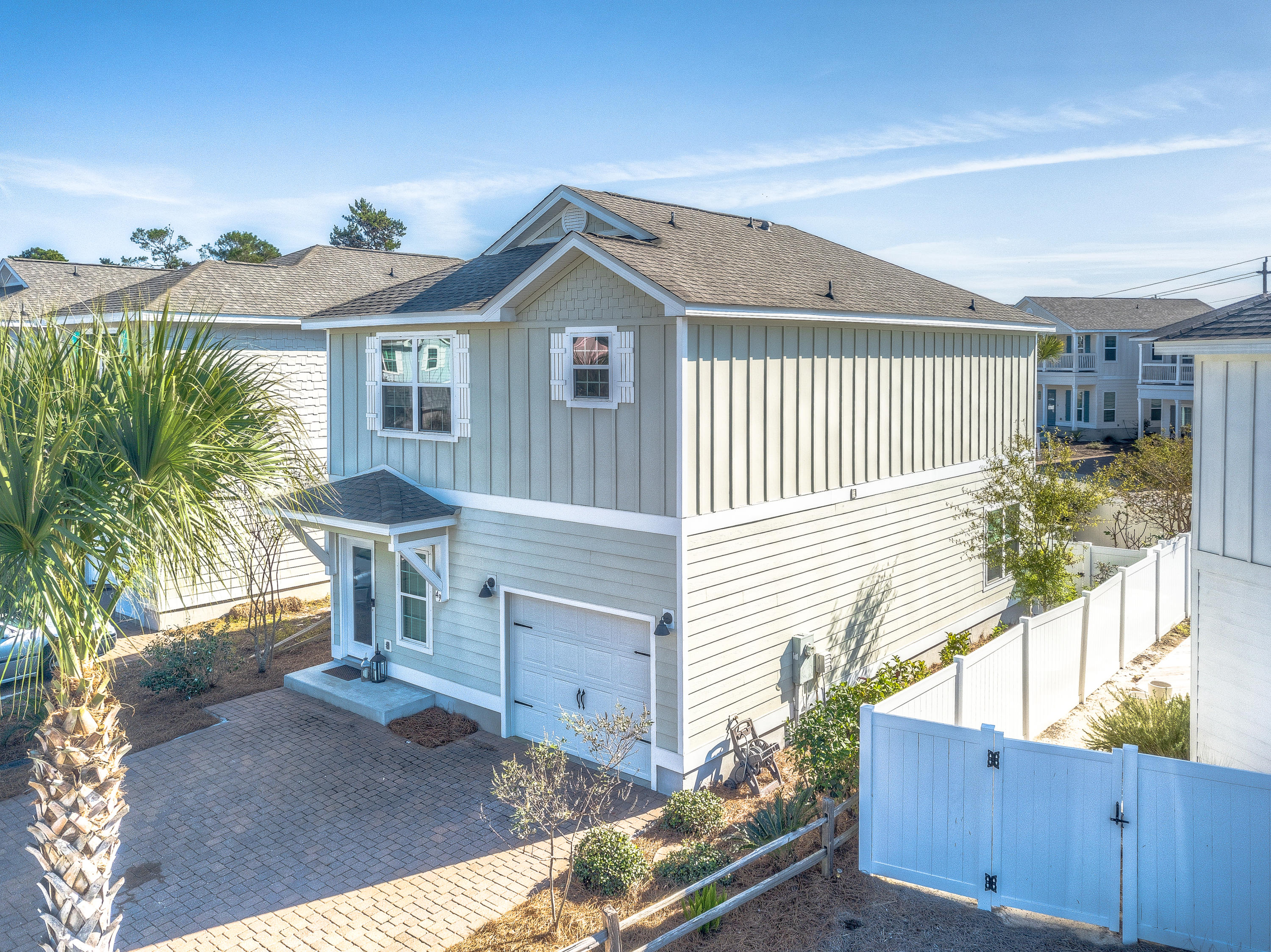49 Topside Drive Inlet Beach, FL 32461 - Photo 1 of 46 a view of a house with a yard and potted plants