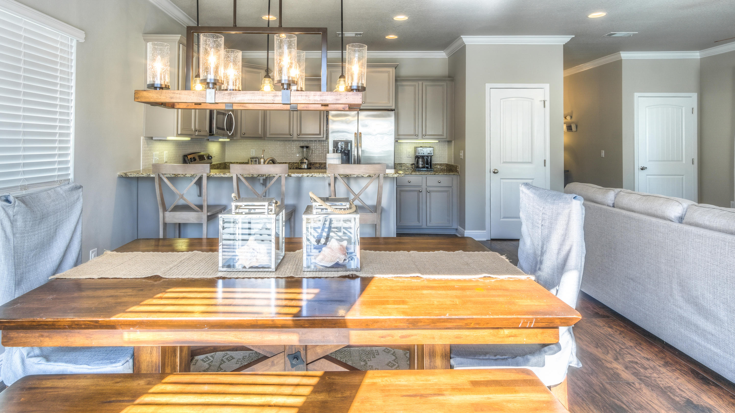 49 Topside Drive Inlet Beach, FL 32461 - Photo 17 of 46 a room with stainless steel appliances kitchen island granite countertop a dining table and chairs