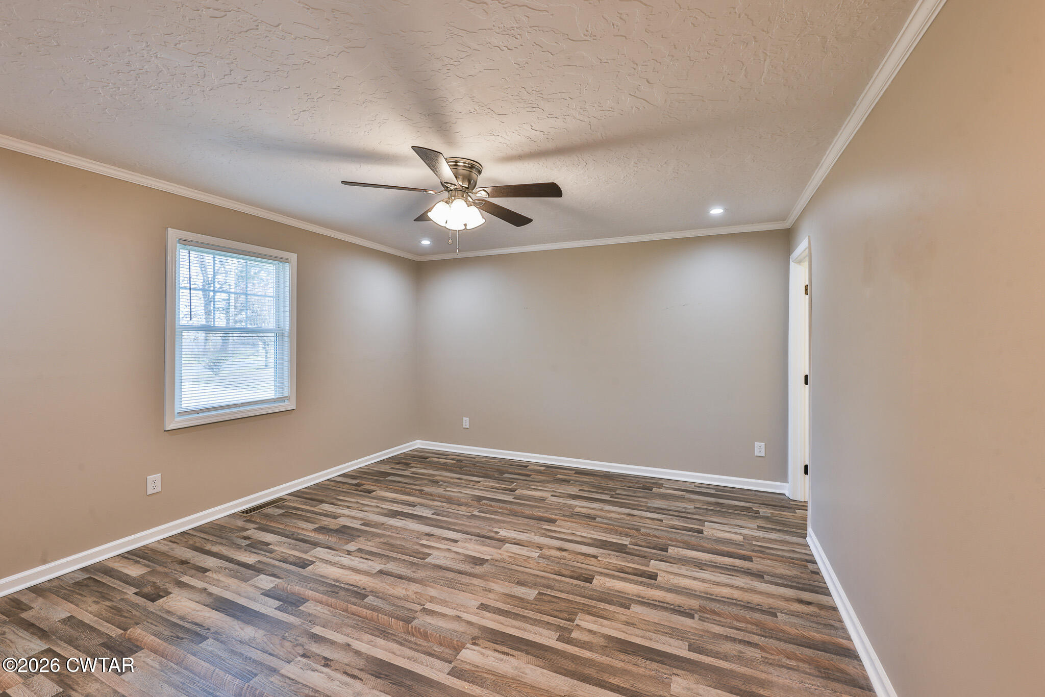 2479 Billingsby Road Martin, TN 38237 - Photo 13 of 29 wooden floor in an empty room with a window