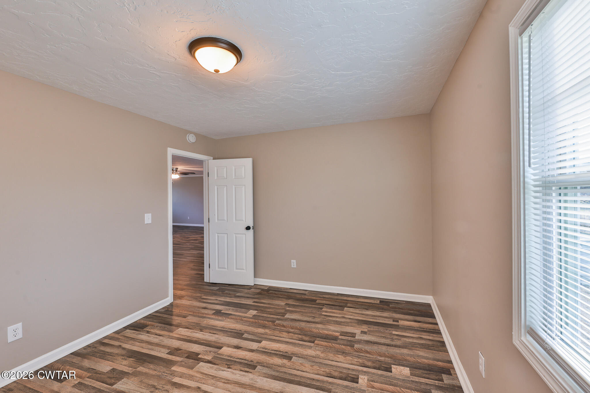 2479 Billingsby Road Martin, TN 38237 - Photo 17 of 29 a view of a room with wooden floor and window