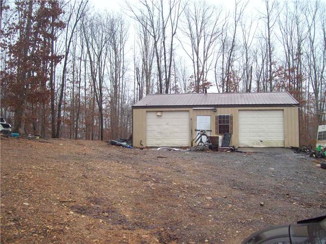 0 Patton Park Road Lyles, TN 37098 - Photo 5 of 9 a view of a house with large space and a car parked in front of it