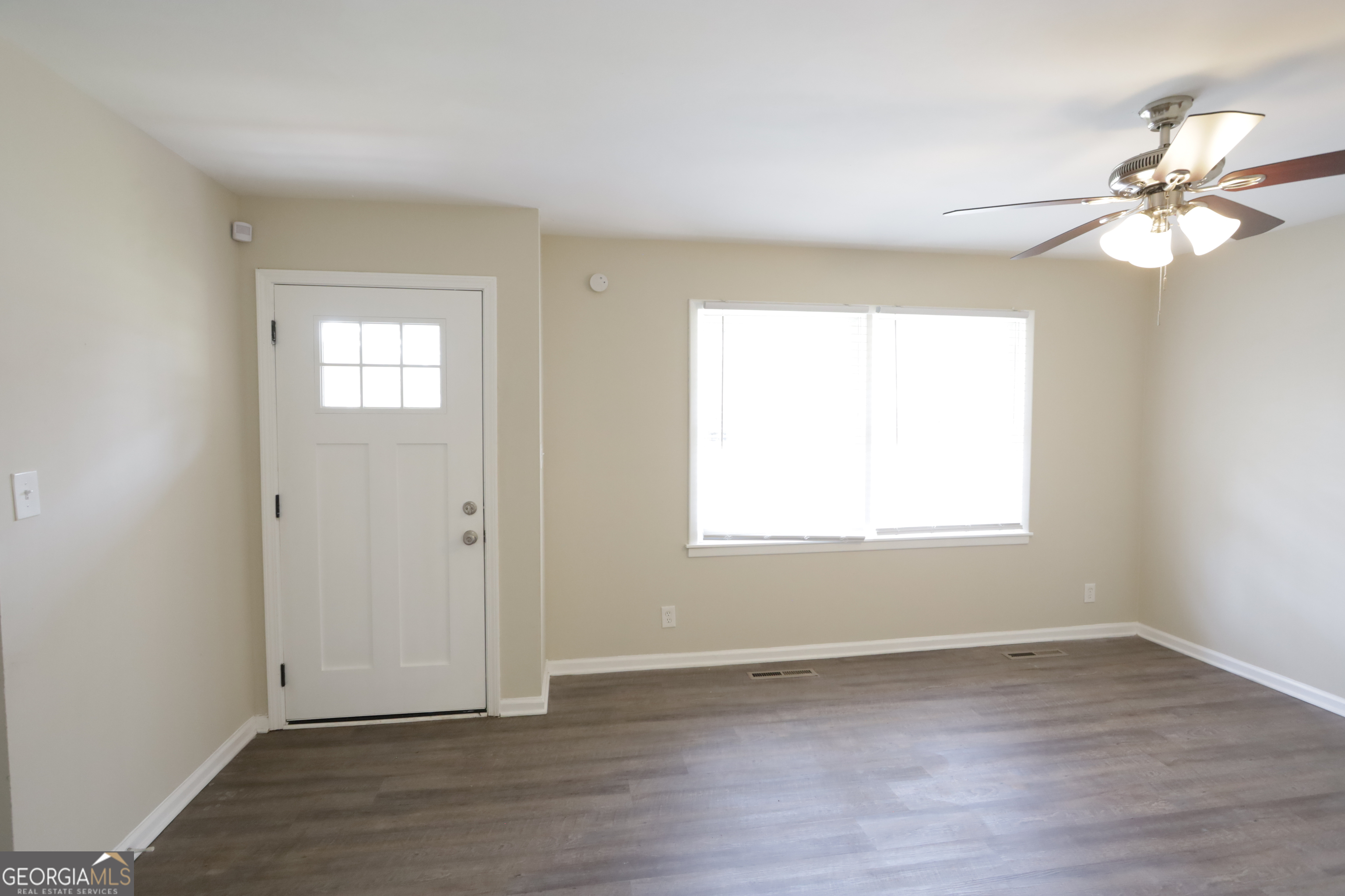 4326 Aldergate Drive Decatur, GA 30035 - Photo 3 of 11 an empty room with wooden floor closet and windows
