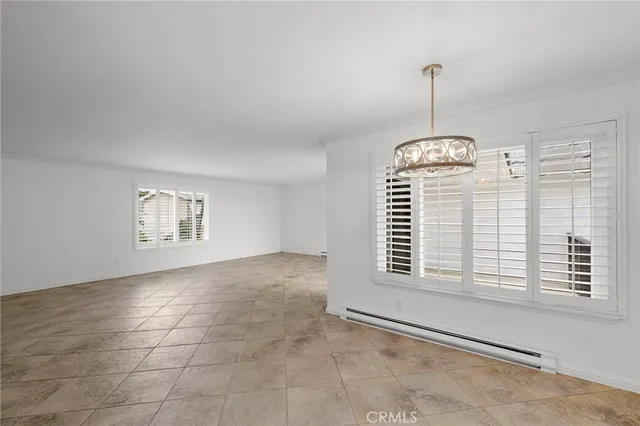 a view of empty room with windows